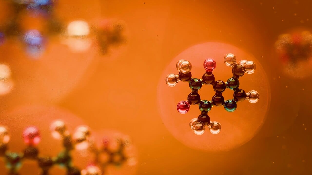 Image with orange tint showing peptide molecule